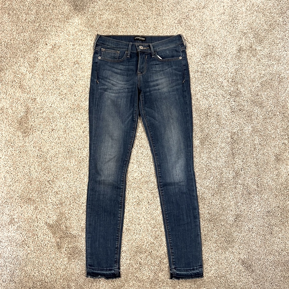 Express like new mid rise jean leggings size 2
